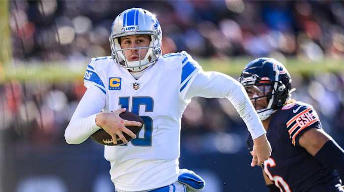 Nov 13, 2022; Chicago, Illinois, USA; Detroit Lions quarterback Jared Goff (16) runs the ball in the fourth quarter against the Chicago Bears at Soldier Field.